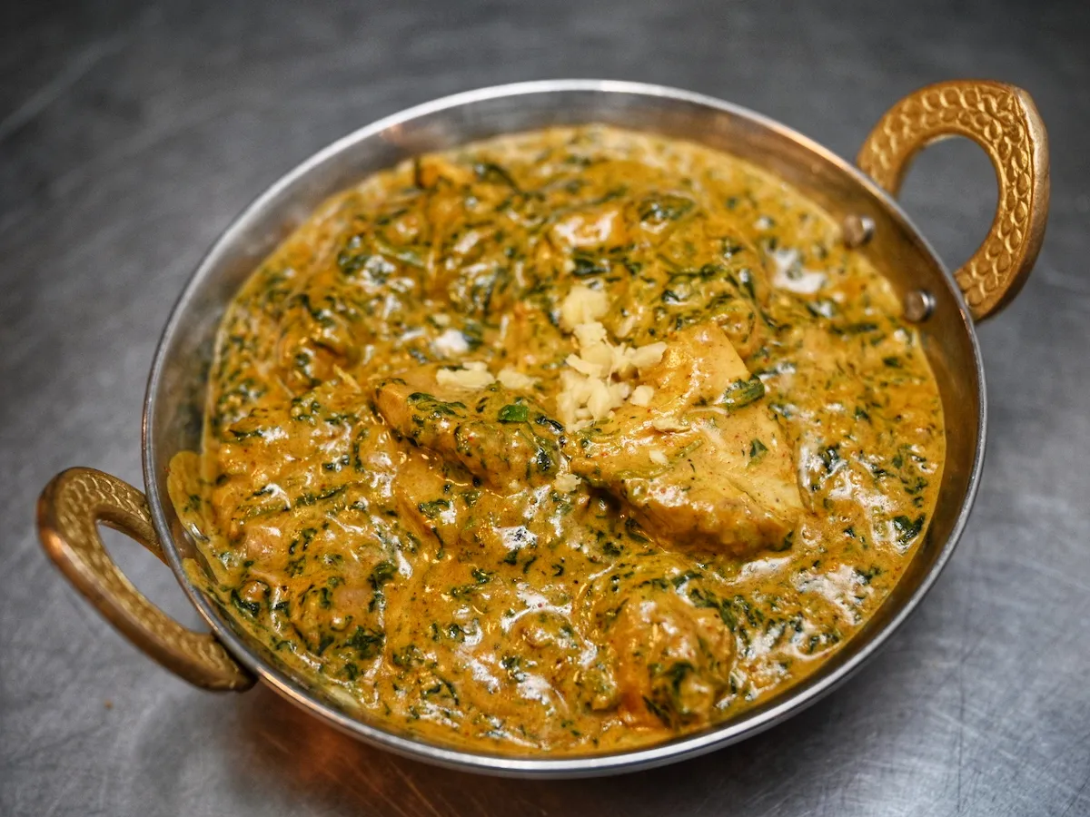Chicken Palak – Succulent chicken slow-cooked in creamy spiced spinach sauce | SPICE ROOM Denver