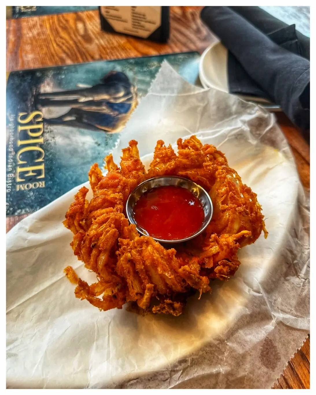 Onion Bhaji – Crispy onion fritters in spiced chickpea batter. Gluten-free. | SPICE ROOM Denver happy hour
