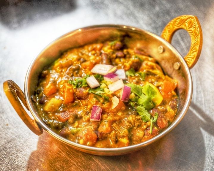 Dal Makhani — Black lentils and kidney beans slow-simmered overnight with 