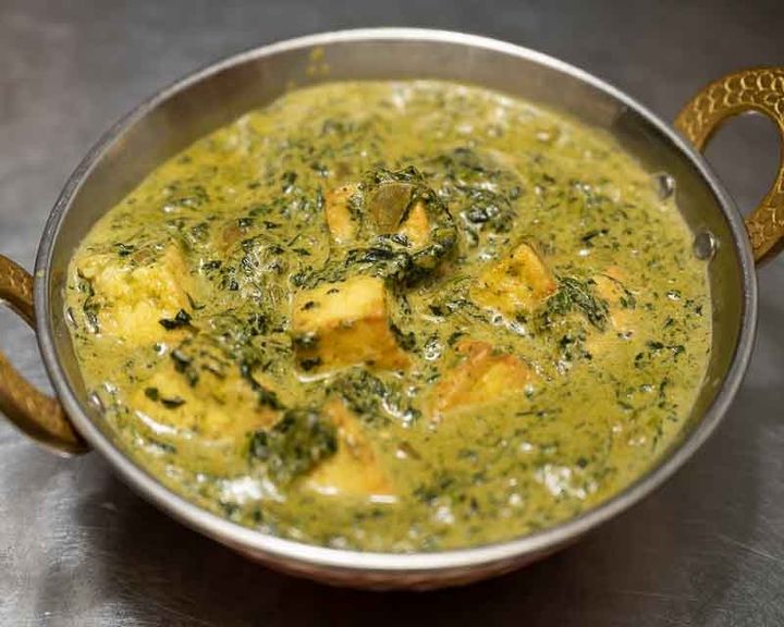 Palak Paneer – Cubes of fresh paneer cheese in a velvety spinach gravy, seasoned with cumin, ga | SPICE ROOM Denver
